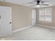 Bedroom with neutral paint, carpeted floors, and a double door closet provides ample storage at 7999 Englewood Rd, Indianapolis, IN 46240