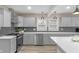 Well-designed kitchen with stainless steel appliances and sleek countertops at 7999 Englewood Rd, Indianapolis, IN 46240