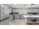 Updated kitchen featuring stainless steel appliances and an island at 7999 Englewood Rd, Indianapolis, IN 46240