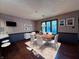 Comfortable dining area with a modern chandelier, hardwood floors, and beautiful decor at 8150 Foxchase Cir, Indianapolis, IN 46256