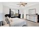 Spacious bedroom showcases tray ceiling, closet access, large windows, and neutral color palette at 9063 Moyer Pl, Pendleton, IN 46064