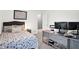 Bedroom featuring a bed, desk, and two computer monitors at 9063 Moyer Pl, Pendleton, IN 46064