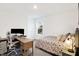 This bedroom has a nice view of the neighborhood and an ergonomic chair in the office area at 9063 Moyer Pl, Pendleton, IN 46064