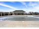 Community pool featuring a large pool with a covered lounge area and chairs for relaxation at 9063 Moyer Pl, Pendleton, IN 46064
