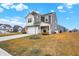 Beautiful home featuring a well-manicured front lawn and inviting front entrance at 9063 Moyer Pl, Pendleton, IN 46064