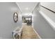 Open foyer leading to the dining and living areas with views of staircase at 9063 Moyer Pl, Pendleton, IN 46064