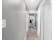 Hallway featuring carpet, neutral colored walls, and white trim at 9063 Moyer Pl, Pendleton, IN 46064