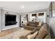 Inviting living room featuring a wall-mounted TV, modern decor, and comfortable seating at 9063 Moyer Pl, Pendleton, IN 46064