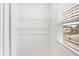 A walk-in closet with adjustable shelving and a window at 9063 Moyer Pl, Pendleton, IN 46064