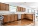 Lovely kitchen featuring stainless steel dishwasher and views of the backyard at 9239 Stones Ferry Way, Indianapolis, IN 46278