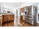 Spacious kitchen featuring stainless steel refrigerator and ample counter space at 9239 Stones Ferry Way, Indianapolis, IN 46278