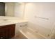 Bathroom with a tub and single vanity at 9523 Maple Way, Indianapolis, IN 46268