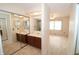 Bathroom featuring double sinks and mirror at 9523 Maple Way, Indianapolis, IN 46268