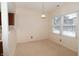 Cozy dining area with a bright window, offering a comfortable space for meals at 9523 Maple Way, Indianapolis, IN 46268
