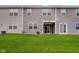 The property features a well-maintained lawn and views of the rear siding and patios at 9634 Beckett St, Avon, IN 46123