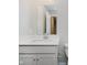 Bathroom features a mirror, quartz countertops, and a vanity with modern fixtures at 9634 Beckett St, Avon, IN 46123