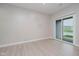 Bright bedroom featuring a sliding glass door leading to a patio and natural light at 9634 Beckett St, Avon, IN 46123
