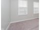 Bright bedroom featuring plush carpeting, neutral walls, and windows letting in natural light at 9634 Beckett St, Avon, IN 46123