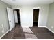 This bedroom offers access to a walk-in closet and another room at 9634 Beckett St, Avon, IN 46123