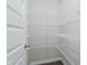 A walk-in closet features wire shelving, offering versatile storage options at 9634 Beckett St, Avon, IN 46123