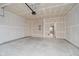 Spacious two-car garage with freshly painted drywall ready for customization to your needs at 9634 Beckett St, Avon, IN 46123