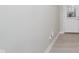 Bright hallway featuring hardwood flooring and white baseboards throughout the home at 9634 Beckett St, Avon, IN 46123