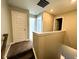 Second-story hallway with access to bedrooms and a full bathroom at 9634 Beckett St, Avon, IN 46123