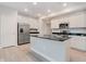Modern kitchen featuring stainless steel appliances, a kitchen island and black countertops at 9634 Beckett St, Avon, IN 46123