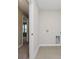 A functional laundry room space awaits with utility connections and a tiled floor, ready for your appliances at 9634 Beckett St, Avon, IN 46123