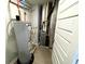 Utility room equipped with a water heater and furnace at 9634 Beckett St, Avon, IN 46123
