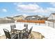 Backyard with a patio set and a view of the fence and adjacent houses at 1058 W Limestone Way, Fortville, IN 46040