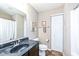 The bathroom features a single sink with cabinets, a toilet, and a shower with a curtain at 1058 W Limestone Way, Fortville, IN 46040