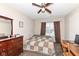 Bedroom with a quilt bed, a dresser and a window at 1058 W Limestone Way, Fortville, IN 46040