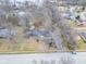 Aerial view of the house highlighting its location and manicured front lawn at 11035 W Lakeshore Dr, Carmel, IN 46033