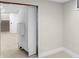 View of an open basement space showing access to the stairs and doorway at 11035 W Lakeshore Dr, Carmel, IN 46033