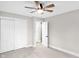 Spacious bedroom features a large closet and adjacent doorway at 11035 W Lakeshore Dr, Carmel, IN 46033