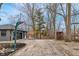 Spacious driveway leading to a detached garage, offering plenty of parking and storage at 11035 W Lakeshore Dr, Carmel, IN 46033