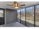 View of screened porch, featuring a ceiling fan, and view of the backyard at 11035 W Lakeshore Dr, Carmel, IN 46033