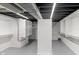 Basement storage area featuring shelving and exposed ducts at 11035 W Lakeshore Dr, Carmel, IN 46033