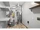Utility room with water heater, furnace and shelving at 1135 Sherwood Dr, Danville, IN 46122