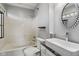 Bathroom featuring a shower/tub combo, toilet, and a modern vessel sink at 1135 Sherwood Dr, Danville, IN 46122