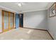 This bedroom features carpeted floors, neutral walls, and crown molding at 1135 Sherwood Dr, Danville, IN 46122