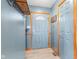 Welcoming foyer with coat rack and a painted front door at 1135 Sherwood Dr, Danville, IN 46122