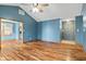 Spacious living room features wood floors, high ceilings, and natural light at 1135 Sherwood Dr, Danville, IN 46122