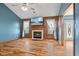 Comfortable living room with hardwood floors and a fireplace feature at 1135 Sherwood Dr, Danville, IN 46122