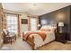 Comfortable bedroom with natural light, stylish curtains, and a neutral color scheme at 13139 Dumbarton St, Carmel, IN 46032
