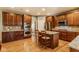 Spacious kitchen with custom cabinets, granite countertops, stainless steel appliances, and central island at 13139 Dumbarton St, Carmel, IN 46032