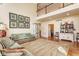 Spacious living room featuring high ceilings, hardwood floors, and comfortable seating at 13139 Dumbarton St, Carmel, IN 46032