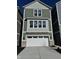 Charming new construction with two-car garage and craftsman-style details, perfect for modern living at 15403 Mystic Rock Dr, Carmel, IN 46033