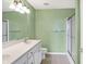 Updated bathroom with a dual-sink vanity, bright lighting, and glass-enclosed shower for a spa-like feel at 17223 Gunther Blvd # 310, Westfield, IN 46074